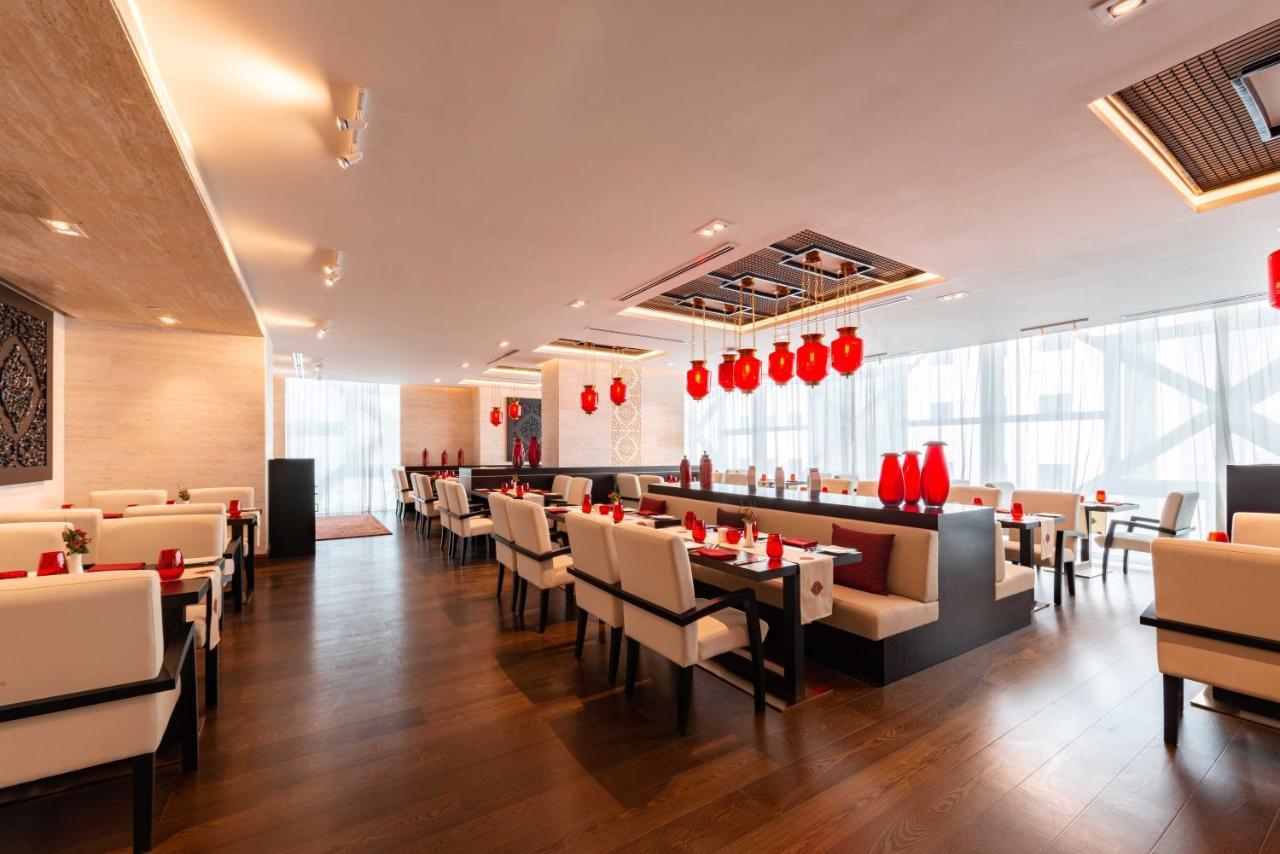 Отель Shaza Доха Экстерьер фото The interior of the restaurant